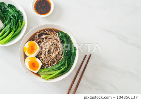 ramen noodles with egg - vegan or vegetarian food style 104856137