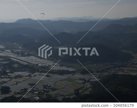 Paraglider flying over Kusu Town Yamada, Kusu Town, Kusu County, Oita Prefecture Paraglider flying over Kusu Town Yamada, Kusu Town, Kusu County, Oita Prefecture 104856179