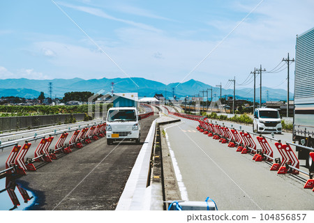 Four-lane highway construction and median strip Saitama Prefectural Road No. 27 Higashimatsuyama Konosu Line 2023.07 Film tone Four-lane highway construction and median strip Saitama Prefectural Road No. 27 Higashimatsuyama Konosu Line 2023.07 Film tone 104856857