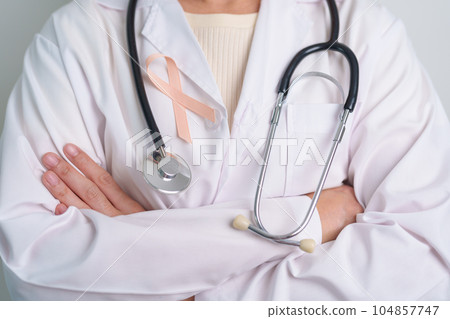 Peach Ribbon for September Uterine Cancer Awareness month. Healthcare and World cancer day concept 104857747
