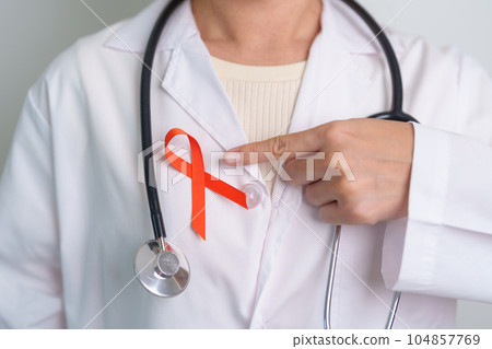 Orange Ribbon for Leukemia, Kidney cancer day, world Multiple Sclerosis, CRPS, Self Injury Awareness month. Healthcare and word cancer day concept 104857769
