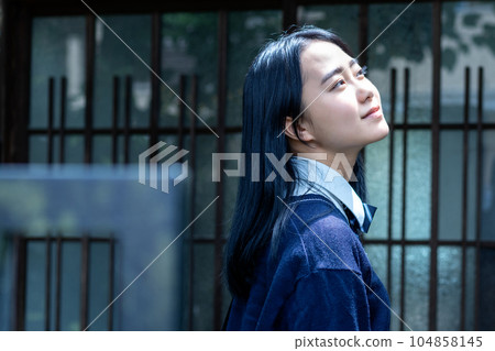 School girls going to school 104858145