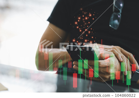 closeup man using smart phone with candle stick graph and dollar sign closeup man using smart phone with candle stick graph and dollar sign 104860022