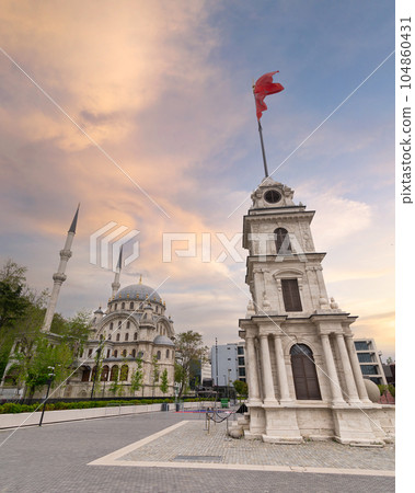 Tophane Clock Tower, with Nusretiye imperial Ottoman Mosque in the background, at Galata Port, Beyoglu, Istanbul, Turkey Tophane Clock Tower, with Nusretiye imperial Ottoman Mosque in the background, at Galata Port, Beyoglu, Istanbul, Turkey 104860431