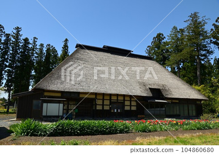 An old private house with a roofed roof An old private house with a roofed roof 104860680