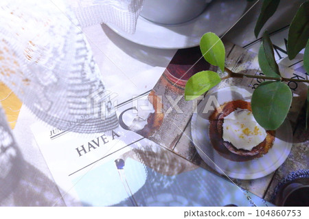 The morning table, being healed by the sunlight filtering through the trees. The morning table, being healed by the sunlight filtering through the trees. 104860753