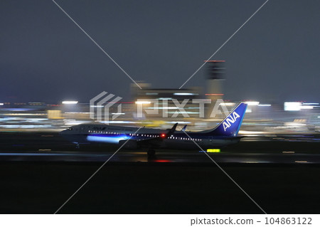 Takeoff and landing at Osaka Itami Airport Takeoff and landing at Osaka Itami Airport 104863122