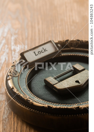 old lock in a frame 104863243