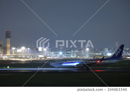 Takeoff and landing at Osaka Itami Airport Takeoff and landing at Osaka Itami Airport 104863340