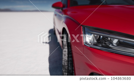 lonely sport car in salt desert 104863680