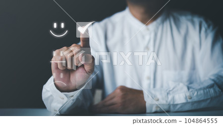 Man give rating check box and smiley face symbold, satisfaction concept . Man give rating check box and smiley face symbold, satisfaction concept . 104864555