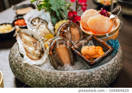 Seafood cuisine plate gourmet dinner background. Seafood cuisine plate gourmet dinner background. 104864820