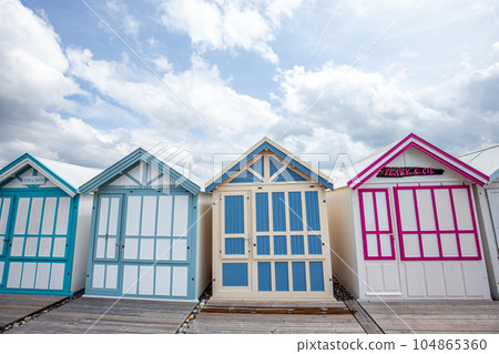 Colorful beach huts in Cayeux, Normandy, France Colorful beach huts in Cayeux, Normandy, France 104865360