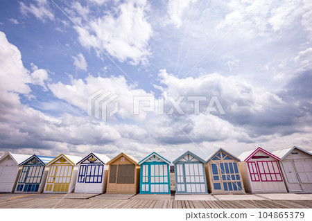 Colorful beach huts in Cayeux, Normandy, France Colorful beach huts in Cayeux, Normandy, France 104865379