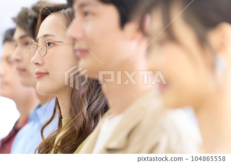 Profile of business people standing side by side Profile of business people standing side by side 104865558
