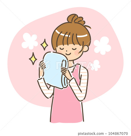 A woman who smiles at the nice scented laundry Background A woman who smiles at the nice scented laundry Background 104867070