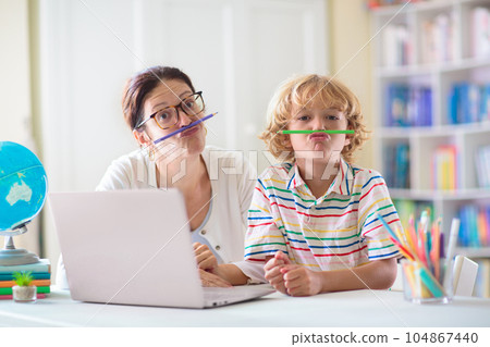 Online remote learning. School kids with computer. Online remote learning. School kids with computer. 104867440