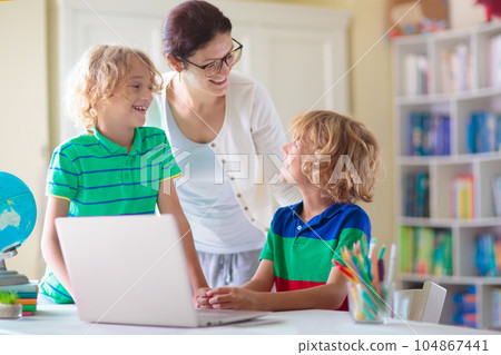 Online remote learning. School kids with computer. Online remote learning. School kids with computer. 104867441