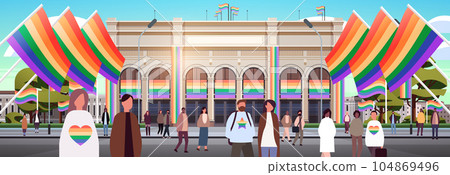 mix race people with lgbt rainbow flags gay lesbian love parade pride festival transgender love concept 104869496