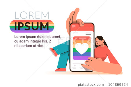 woman using smartphone with lgbt rainbow flag on screen gay lesbian love parade pride festival transgender love concept 104869524
