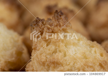 Small homemade coconut cookies made using coconut chips Small homemade coconut cookies made using coconut chips 104869917