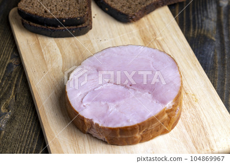 A sliced piece of delicious pork meat A sliced piece of delicious pork meat 104869967
