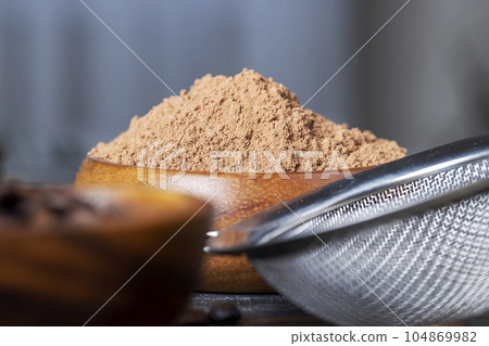 crumbly powder from cocoa beans crumbly powder from cocoa beans 104869982