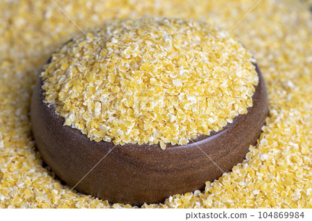 small corn flakes for making porridge 104869984