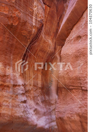 The Siq, wall texture, canyon of Petra, Jordan 104870630