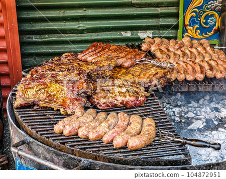 Argentine food called Parrillada served in the La Boca neighborhood, Buenos Aires, Argentina Argentine food called Parrillada served in the La Boca neighborhood, Buenos Aires, Argentina 104872951