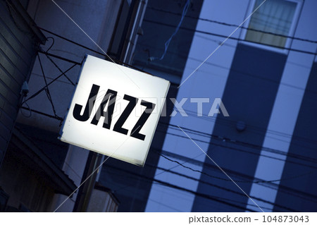 JAZZ billboard lit in the evening JAZZ billboard lit in the evening 104873043