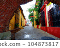Street seen through brick tunnel 104873817