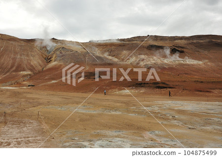 Beautiful view of the Hot springs in Hverir, Iceland 104875499