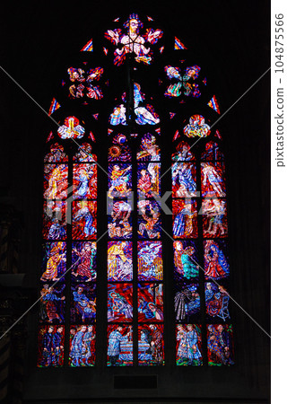 Vertical shot of the a stained glass window in St Vitus Cathedral in Prague, Czech Republic 104875566