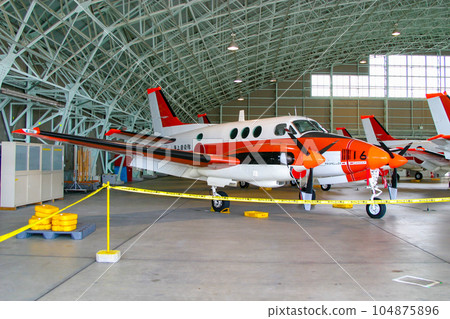 Maritime Self-Defense Force training aircraft TC-90 housed in the hangar Maritime Self-Defense Force training aircraft TC-90 housed in the hangar 104875896