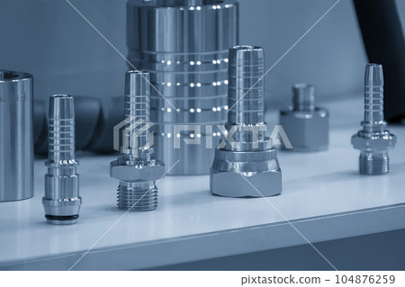 Close up scene quick release the group of coupling connector fitting parts. Close up scene quick release the group of coupling connector fitting parts. 104876259