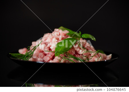 chopped fresh minced pork meat in a plate chopped fresh minced pork meat in a plate 104876645