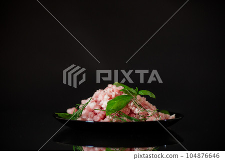 chopped fresh minced pork meat in a plate chopped fresh minced pork meat in a plate 104876646