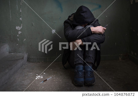 Sitting women in depression, young sadness women crying in old dirty abandoned house. Lifestyle Sitting women in depression, young sadness women crying in old dirty abandoned house. Lifestyle 104876872