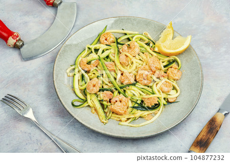 Shrimp with vegetable garnish. 104877232