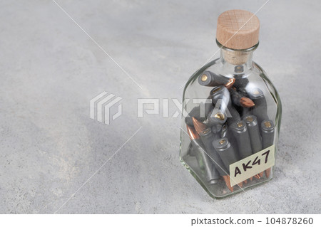 kalashnikov 7.62mm bullets in a spice jar kalashnikov 7.62mm bullets in a spice jar 104878260