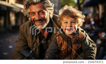 Portrait of a father playing and walking with his young son, parenthood 104878351