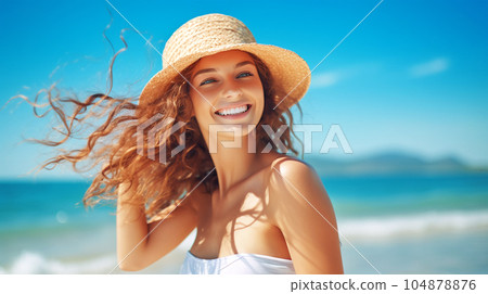 Portrait of a beautiful girl with long loose hair on the beach in front of the sea 104878876