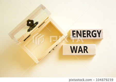 Energy war symbol. Concept words Energy war on beautiful wooden block. Beautiful white table white background. Empty wooden chest. Business and Energy war concept. Copy space. Energy war symbol. Concept words Energy war on beautiful wooden block. Beautiful white table white background. Empty wooden chest. Business and Energy war concept. Copy space. 104879239