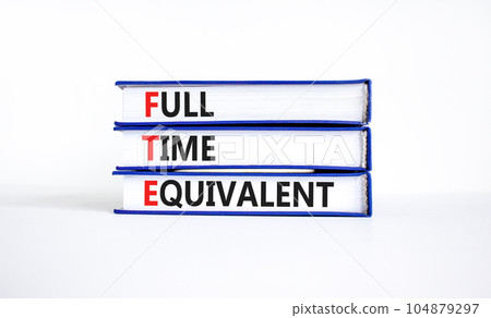 FTE Full time equivalent symbol. Concept words FTE Full time equivalent on books. Beautiful white table white background. Business and FTE Full time equivalent concept. Copy space. 104879297