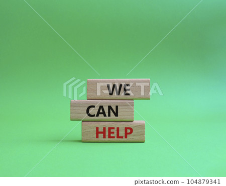 We can help symbol. Wooden blocks with words We can help. Beautiful green background. Business and We can help concept. Copy space. 104879341