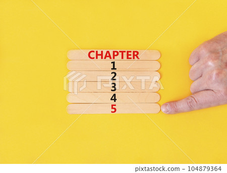 Time to chapter 5 symbol. Concept word Chapter 1 2 3 4 5 on wooden sticks. Businessman hand. Beautiful yellow table yellow background. Business planning and time to chapter 5 concept. Copy space. Time to chapter 5 symbol. Concept word Chapter 1 2 3 4 5 on wooden sticks. Businessman hand. Beautiful yellow table yellow background. Business planning and time to chapter 5 concept. Copy space. 104879364