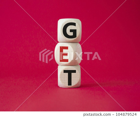 GET symbol. Concept word GET on wooden cubes. Beautiful red background. Business and GET concept. Copy space. 104879524