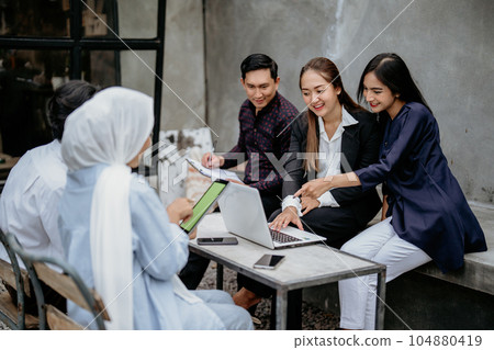 Looking for ideas. Portrait of a group of businesspeople in meeting Looking for ideas. Portrait of a group of businesspeople in meeting 104880419