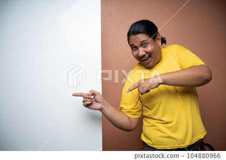 old asian man standing beside empty white board with poiting gesture old asian man standing beside empty white board with poiting gesture 104880966